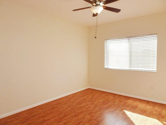 5927 Riverside Ave, Tamarac, FL 33321 - empty room featuring light wood-style floors, ceiling fan, and baseboards