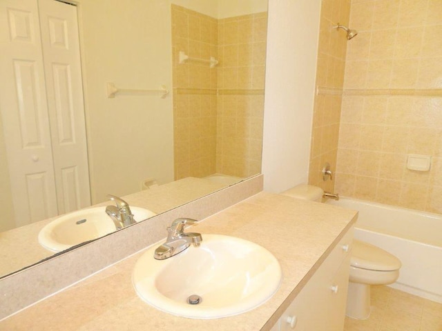 5927 Riverside Ave, Tamarac, FL 33321 - full bath featuring toilet, vanity, shower / bath combination, tile patterned floors, and a closet