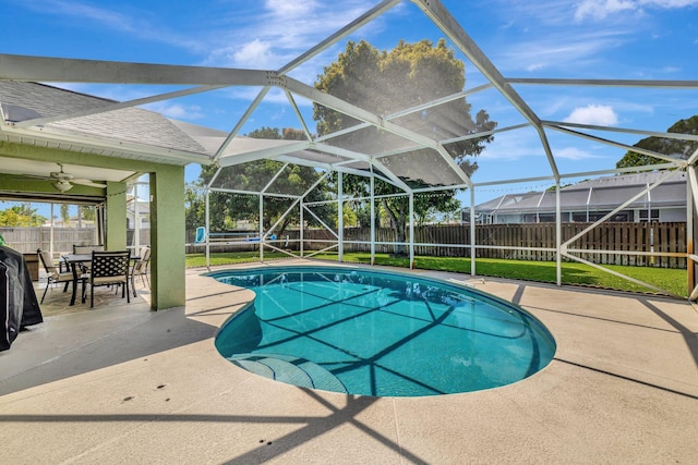 401 SE Ron Rico Ter, Port Saint Lucie, FL 34983 - view of swimming pool with a fenced backyard, a patio area, and glass enclosure