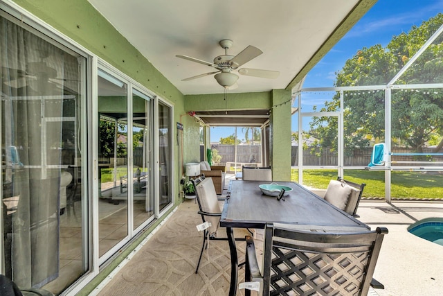 401 SE Ron Rico Ter, Port Saint Lucie, FL 34983 - sunroom with a ceiling fan and outdoor dining space