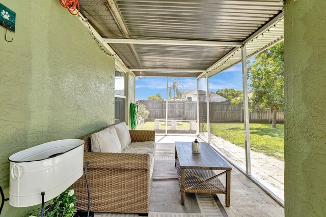 401 SE Ron Rico Ter, Port Saint Lucie, FL 34983 - sunroom with an outdoor hangout area