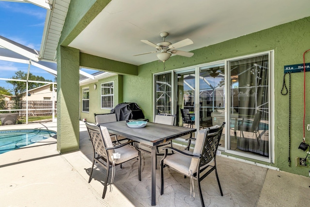 401 SE Ron Rico Ter, Port Saint Lucie, FL 34983 - view of patio featuring ceiling fan, a lanai, and outdoor dining space