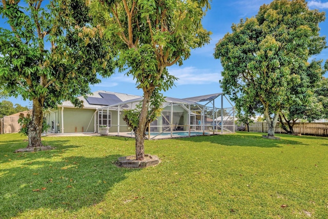 401 SE Ron Rico Ter, Port Saint Lucie, FL 34983 - view of yard with a patio area and a lanai
