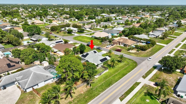 401 SE Ron Rico Ter, Port Saint Lucie, FL 34983 - aerial view of property and surrounding area with nearby suburban area