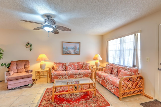 25 Lake Vista Trl Unit 203, Port Saint Lucie, FL 34952 - living room featuring light tile patterned flooring, ceiling fan, and a textured ceiling