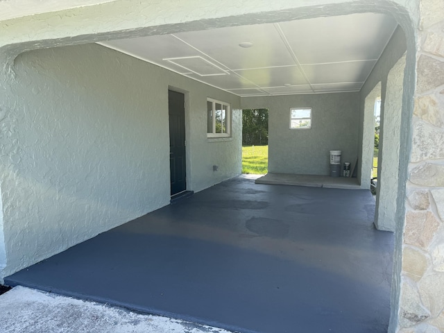 1962 SE Manth Ln, Port Saint Lucie, FL 34983 - view of patio featuring an attached carport