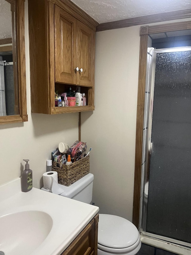 702 48th St, West Palm Beach, FL 33407 - full bath featuring a stall shower, toilet, and vanity