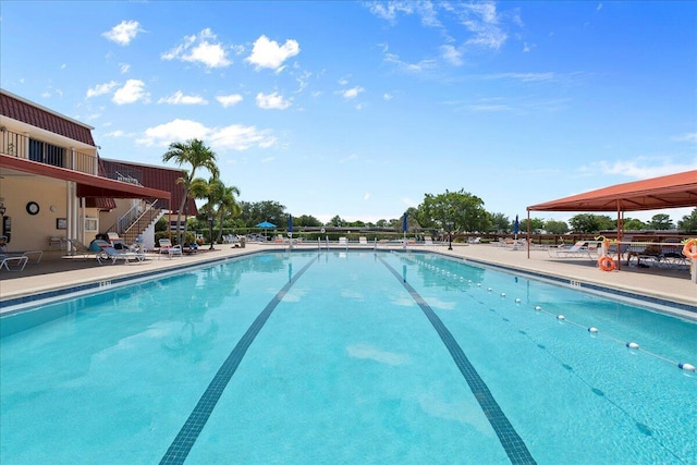 884 Worcester Ln, Lake Worth, FL 33467 - community pool featuring stairway and a patio