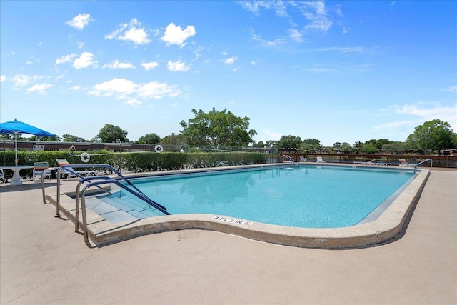 884 Worcester Ln, Lake Worth, FL 33467 - community pool with a patio