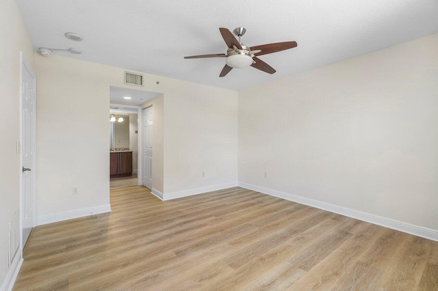 610 Clematis St Unit 236, West Palm Beach, FL 33401 - unfurnished room featuring ceiling fan, light wood-style flooring, and baseboards