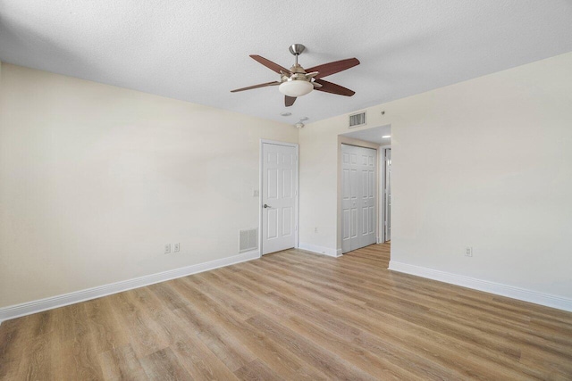 610 Clematis St Unit 236, West Palm Beach, FL 33401 - spare room featuring baseboards, ceiling fan, and light wood-type flooring