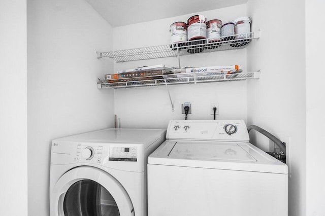 610 Clematis St Unit 236, West Palm Beach, FL 33401 - laundry area with independent washer and dryer