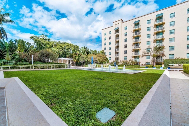 610 Clematis St Unit 236, West Palm Beach, FL 33401 - view of home's community with a lawn