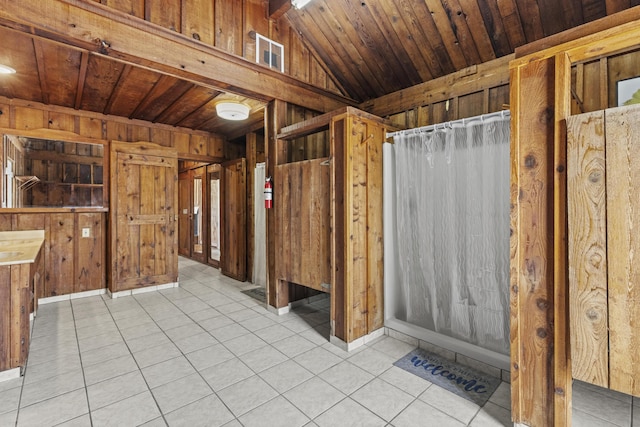 14601 Orange Ave, Fort Pierce, FL 34945 - bathroom featuring wood walls, wood ceiling, and tile patterned flooring