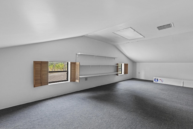 14601 Orange Ave, Fort Pierce, FL 34945 - additional living space with vaulted ceiling and carpet