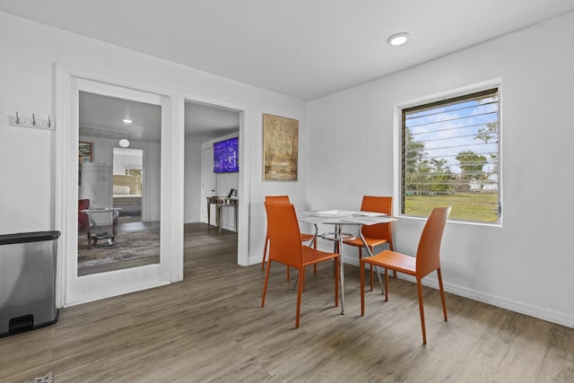 14601 Orange Ave, Fort Pierce, FL 34945 - dining space with wood finished floors and baseboards