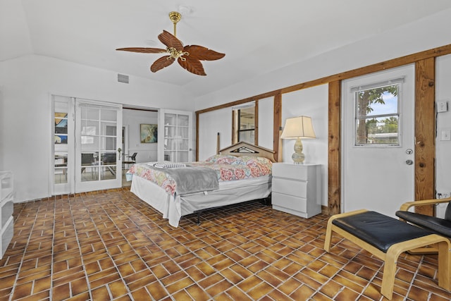 14601 Orange Ave, Fort Pierce, FL 34945 - bedroom with lofted ceiling, a ceiling fan, and brick patterned floors