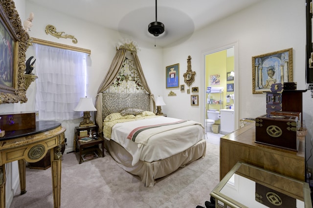 1081 Vintner Blvd, Palm Beach Gardens, FL 33410 - bedroom with light carpet, connected bathroom, and ceiling fan