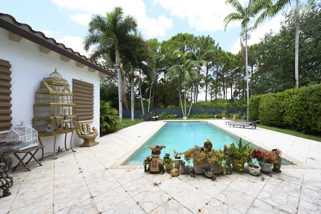 1081 Vintner Blvd, Palm Beach Gardens, FL 33410 - view of swimming pool featuring a patio area