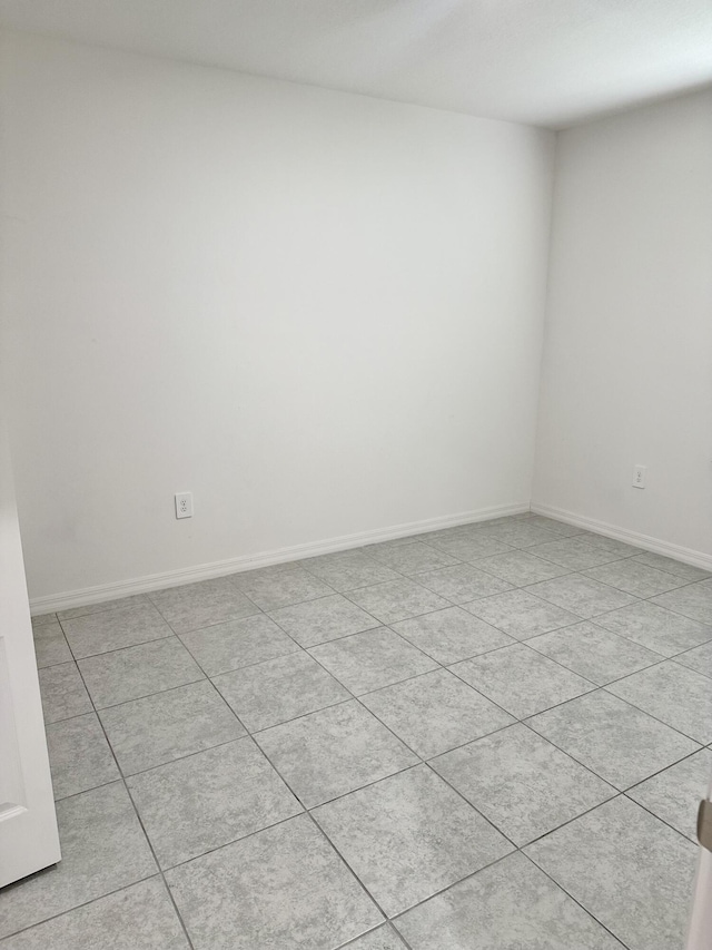 763 SE Evergreen Ter, Port Saint Lucie, FL 34983 - empty room featuring baseboards