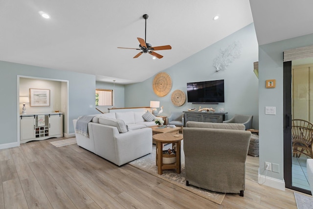 17166 Waterbend Dr Unit 210, Jupiter, FL 33477 - living area featuring vaulted ceiling, ceiling fan, light wood-type flooring, recessed lighting, and baseboards