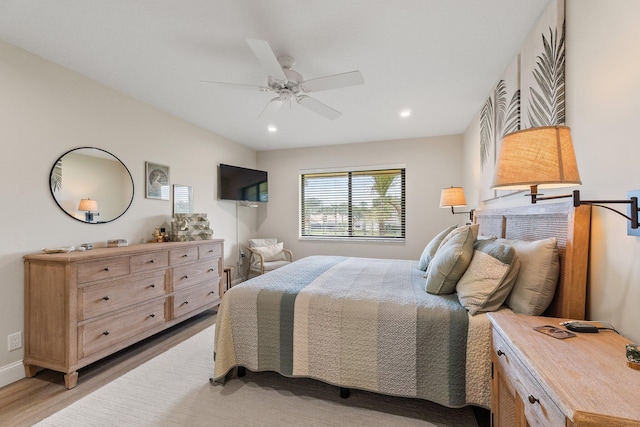 17166 Waterbend Dr Unit 210, Jupiter, FL 33477 - bedroom featuring light wood-style floors, recessed lighting, and a ceiling fan