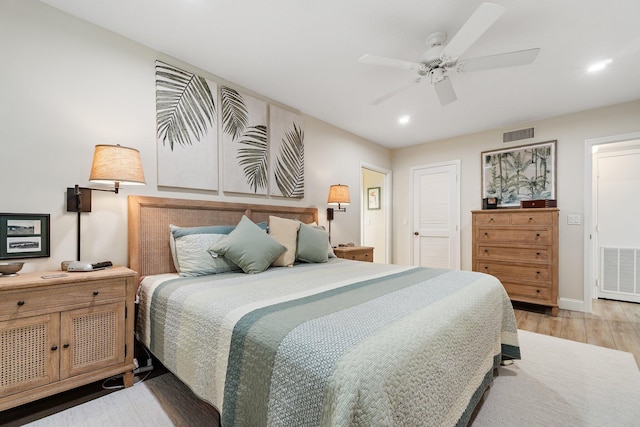 17166 Waterbend Dr Unit 210, Jupiter, FL 33477 - bedroom featuring light wood-style floors, recessed lighting, a ceiling fan, and baseboards