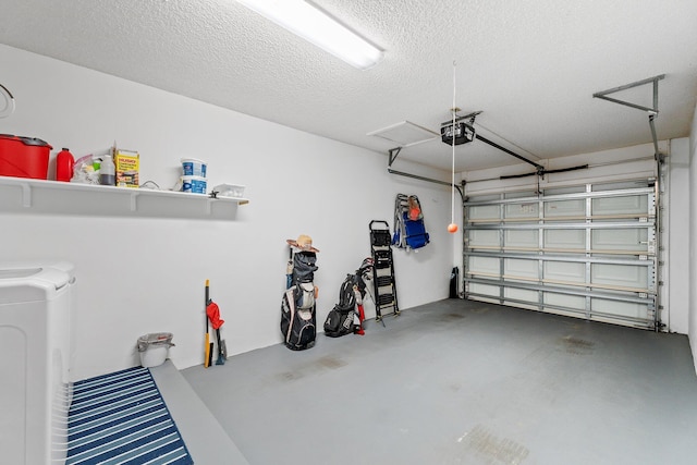 17166 Waterbend Dr Unit 210, Jupiter, FL 33477 - garage featuring washer and dryer and a garage door opener