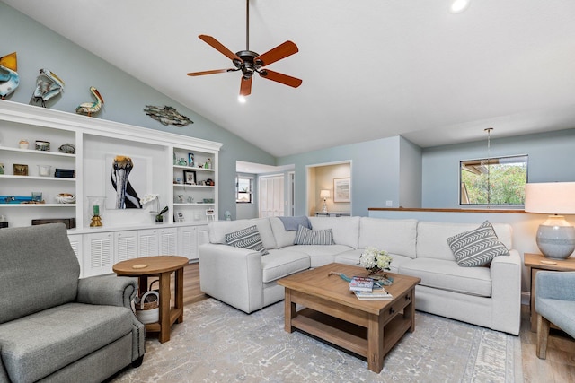 17166 Waterbend Dr Unit 210, Jupiter, FL 33477 - living area with wood finished floors, a ceiling fan, and vaulted ceiling