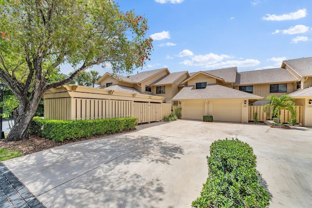 17166 Waterbend Dr Unit 210, Jupiter, FL 33477 - multi unit property featuring an attached garage, concrete driveway, and a shingled roof