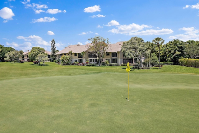 17166 Waterbend Dr Unit 210, Jupiter, FL 33477 - view of community with a yard, a putting green, and golf course view
