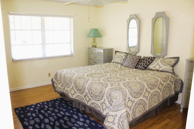 540 High Point Dr Unit A, Delray Beach, FL 33445 - bedroom with wood finished floors, baseboards, and multiple windows