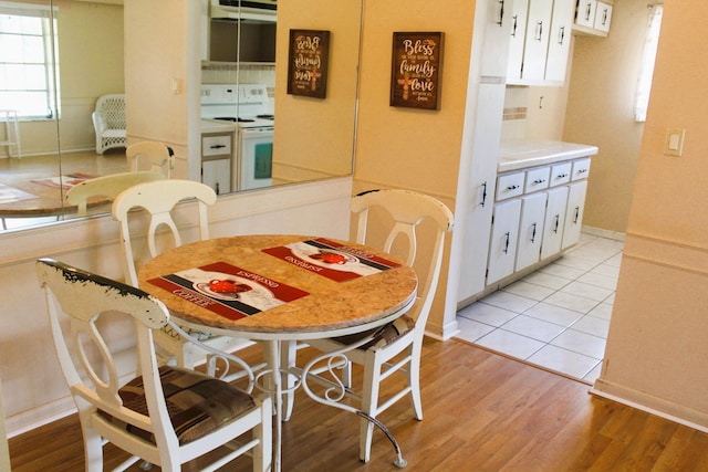 540 High Point Dr Unit A, Delray Beach, FL 33445 - dining room with light wood-style floors and baseboards