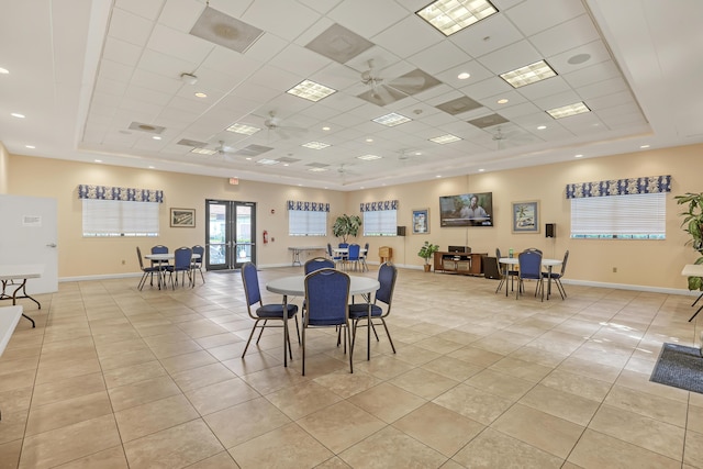 7430 S Ocean Dr Unit 319, Jensen Beach, FL 34957 - dining area with light tile patterned flooring, a tray ceiling, ceiling fan, and recessed lighting