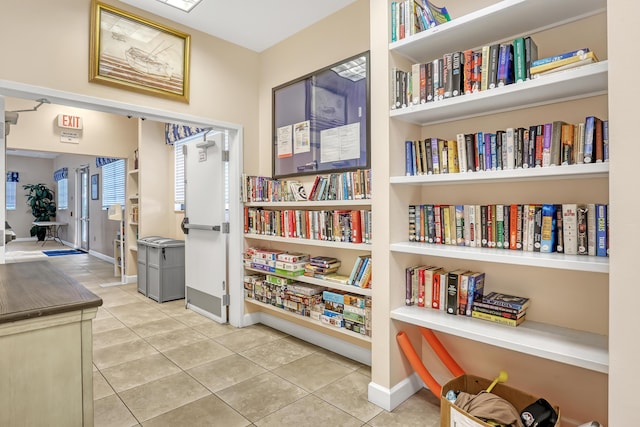 7430 S Ocean Dr Unit 319, Jensen Beach, FL 34957 - sitting room featuring tile patterned flooring and baseboards