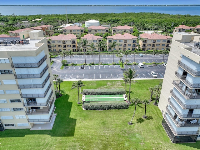 7430 S Ocean Dr Unit 319, Jensen Beach, FL 34957 - drone / aerial view of a large body of water and apartment complex