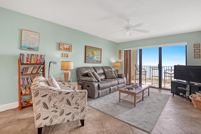 7430 S Ocean Dr Unit 319, Jensen Beach, FL 34957 - living area with ceiling fan and baseboards
