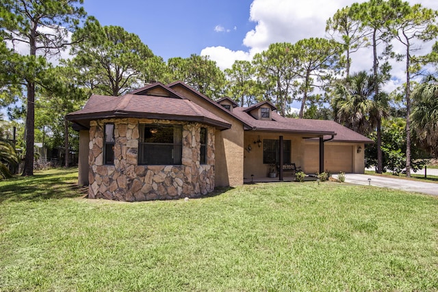 11033 67th Pl N, The Acreage, FL 33412 - view of front facade with stone siding, driveway, an attached garage, and a front lawn