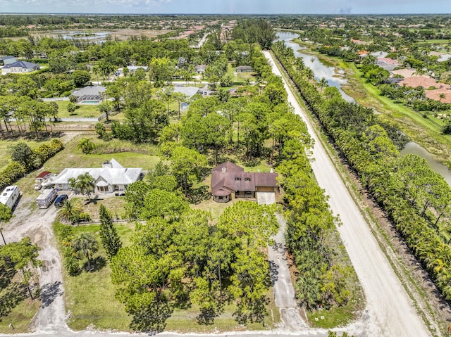 11033 67th Pl N, The Acreage, FL 33412 - aerial view of property's location featuring a large body of water and a tree filled landscape