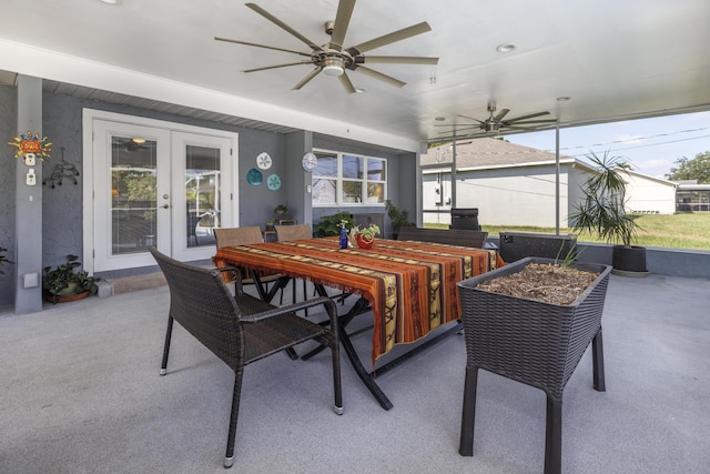 149 SW Grimaldo Ter, Port Saint Lucie, FL 34984 - view of patio / terrace with french doors, a ceiling fan, and outdoor dining space
