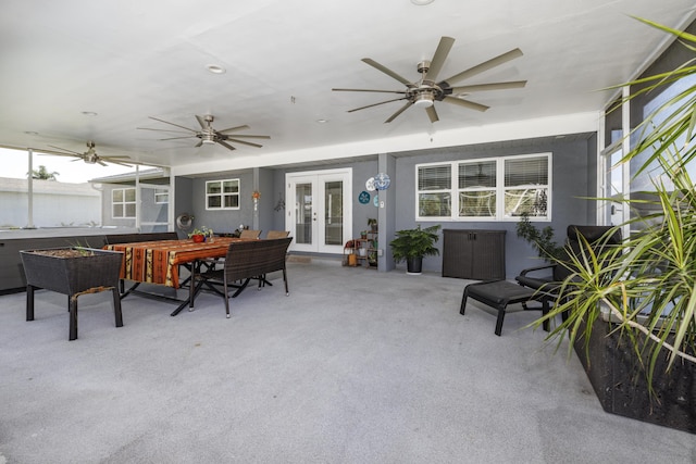 149 SW Grimaldo Ter, Port Saint Lucie, FL 34984 - view of patio / terrace with french doors, ceiling fan, and outdoor dining area