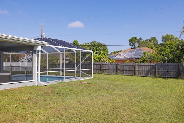 149 SW Grimaldo Ter, Port Saint Lucie, FL 34984 - view of yard featuring glass enclosure