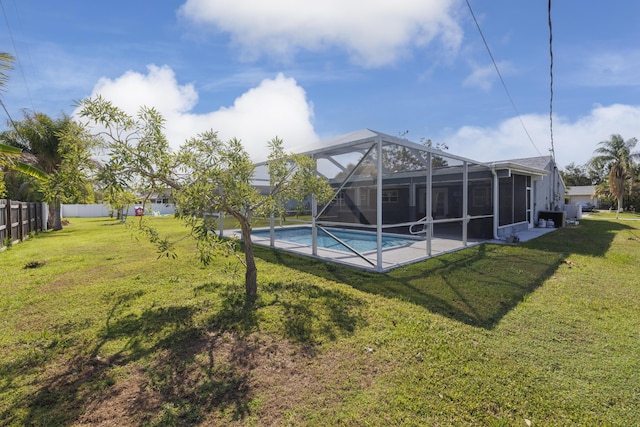 149 SW Grimaldo Ter, Port Saint Lucie, FL 34984 - view of yard featuring glass enclosure
