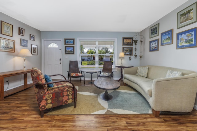 149 SW Grimaldo Ter, Port Saint Lucie, FL 34984 - living area with wood finished floors and baseboards