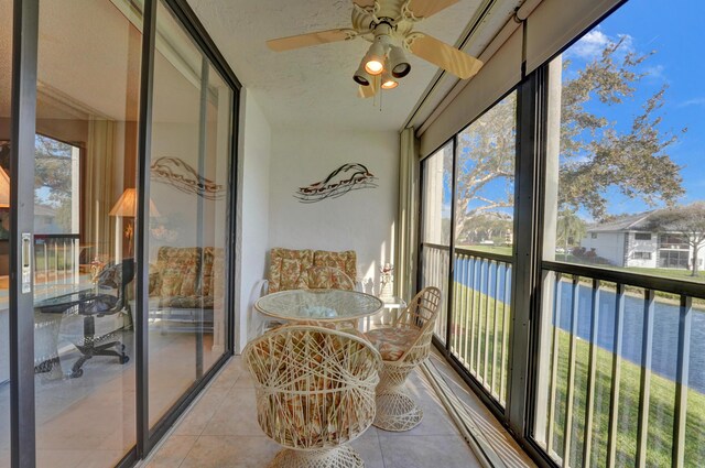 15355 Lakes Of Delray Blvd Unit 211, Delray Beach, FL 33484 - sunroom featuring a ceiling fan, tile patterned flooring, recessed lighting, and a textured ceiling