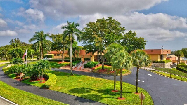 15355 Lakes Of Delray Blvd Unit 211, Delray Beach, FL 33484 - view of property's community featuring a yard