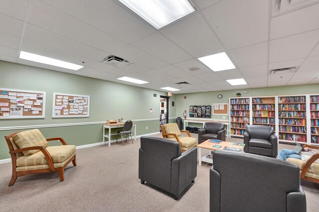 15355 Lakes Of Delray Blvd Unit 211, Delray Beach, FL 33484 - living area with a paneled ceiling, carpet floors, and baseboards