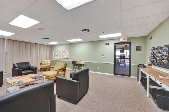 15355 Lakes Of Delray Blvd Unit 211, Delray Beach, FL 33484 - living area featuring light carpet, a drop ceiling, and baseboards