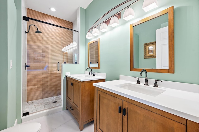 18081 SE Country Club Dr Unit 370, Tequesta, FL 33469 - full bath with a shower stall, two vanities, and toilet