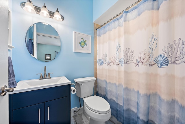 18081 SE Country Club Dr Unit 370, Tequesta, FL 33469 - bathroom featuring vanity, toilet, and a shower with curtain